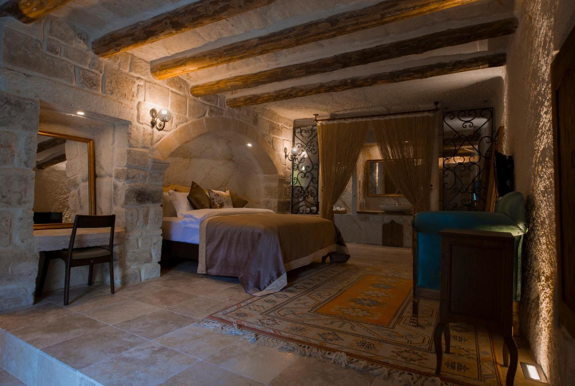 Asuwari Suites Cappadocia Урґюп Номер фото