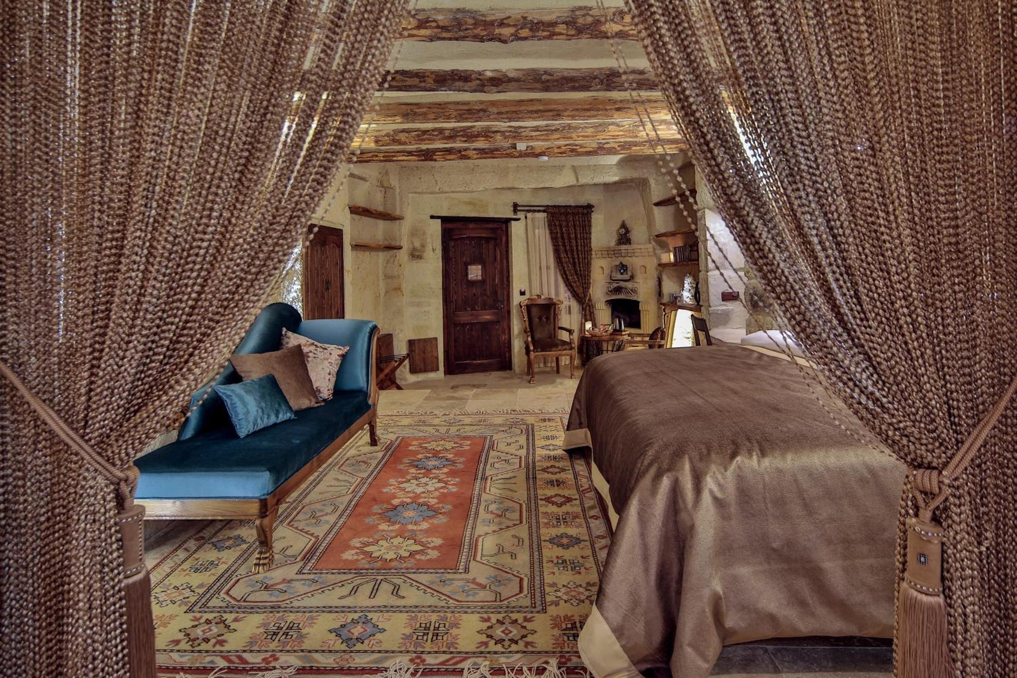 Asuwari Suites Cappadocia Урґюп Номер фото